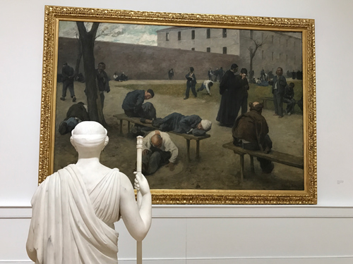 Юнона смотрит на картину Сильвио Ротты «В сумасшедшем доме» (1895)